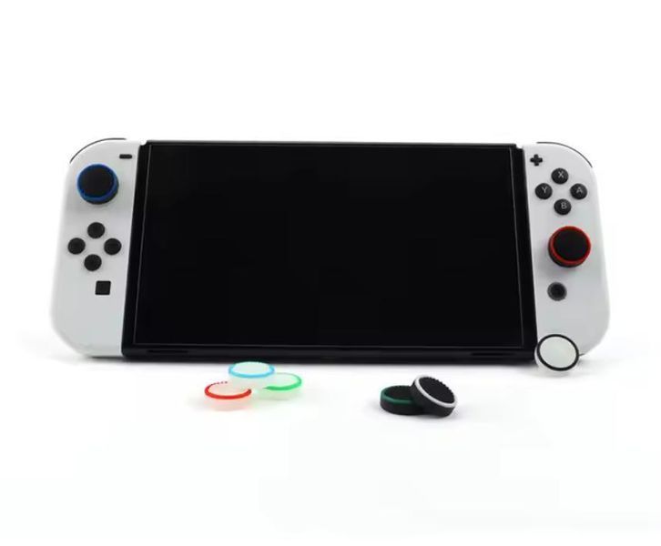 Силиконовые люминесцентные антискользящие накладки на стики White/Blue для Nintendo Switch / Switch OLED / 1363 фото